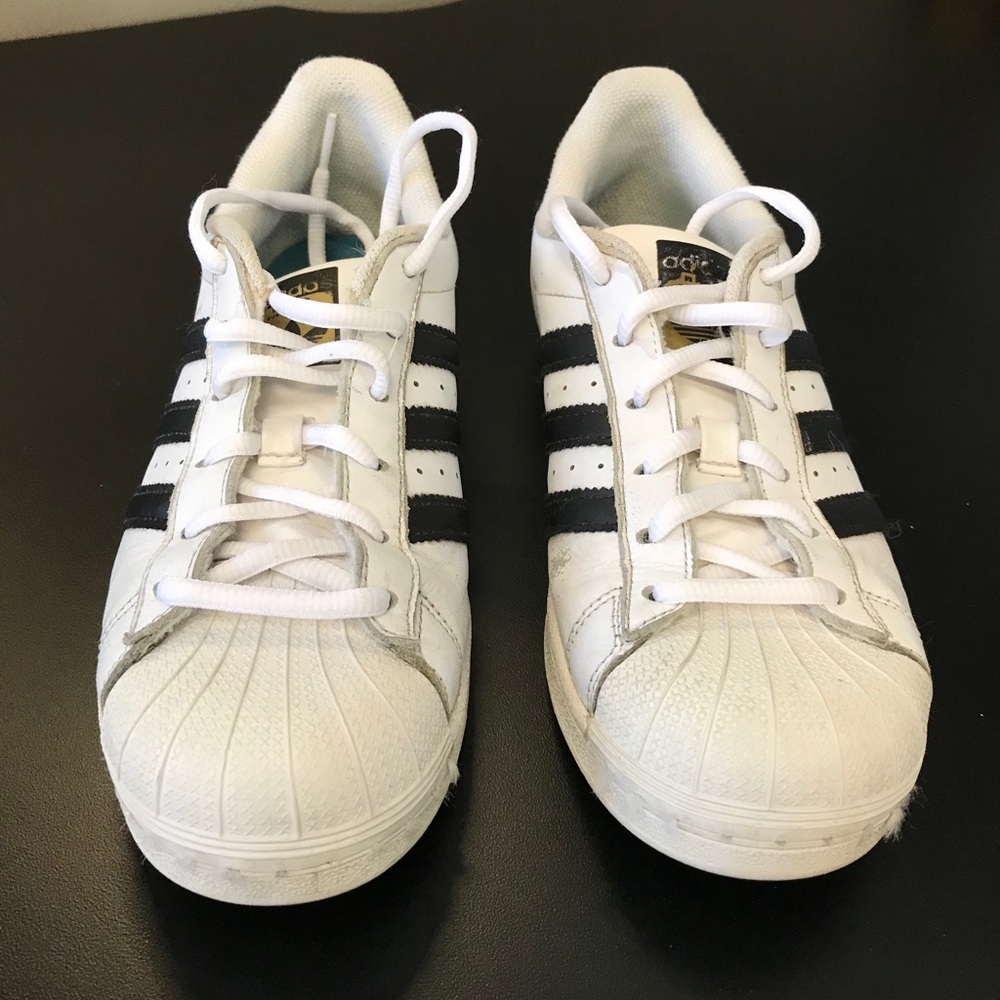 White & black superstar tennis shoes